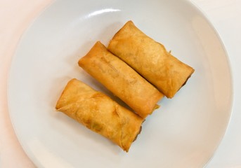 Fried Chinese Spring Rolls in A White Plate