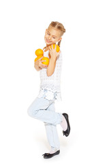 Beauty young girl with fresh oranges