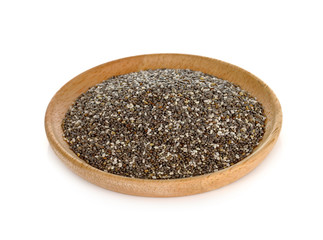 chia seeds in wooden plate on white background