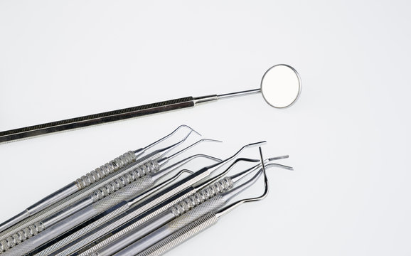 Dentist tools in a white background