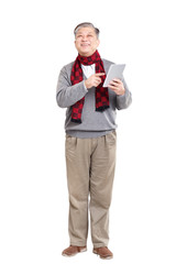 old standing Asian man in jumper with tablet