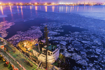 tugboat in the Gulf in the winter night view