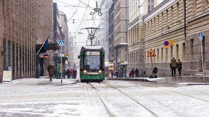 tram on the snowy streets of Helsinki