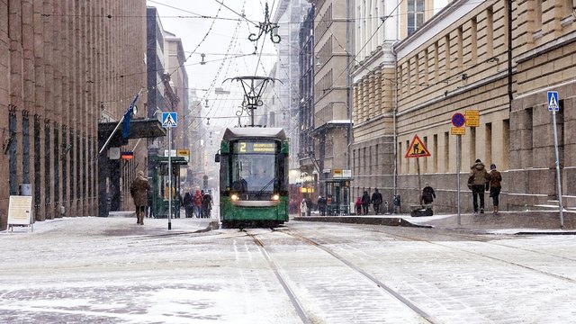 Tram On The Snowy Streets Of Helsinki