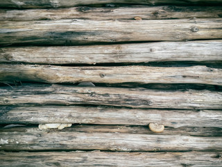 Seamlessly tiling wooden log background