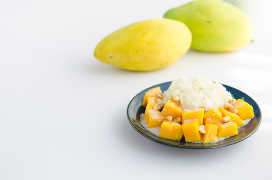 Sweet mango with sticky rice mix with coconut milk