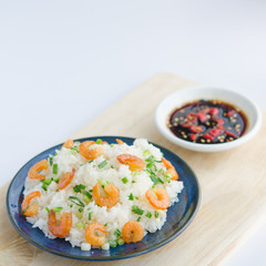 Asian street food. Sticky rice with dry shrimp and onion