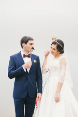 bride and groom attached to  face paper mustache ,  crown  (Valentines Day)