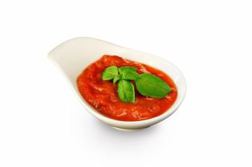 Tomato sauce with basil isolated on white background