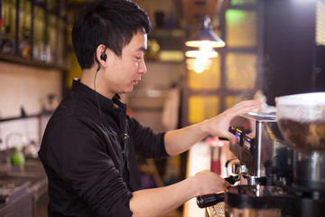 waiter serving in modern cafe