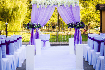 wedding ceremony decorated violet silk
