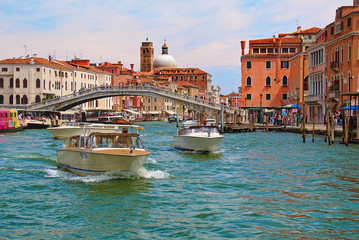 Venice. Boats in Grand Canal near the Ponte degli Scalzi
