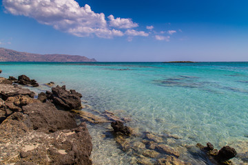 Fototapeta na wymiar A beautiful beach on a Greek island in summer