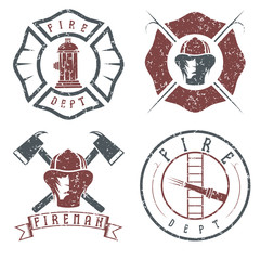 Fototapeta premium grunge set of fire department emblems and badges
