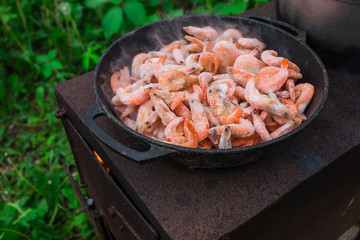 Cooking frozen shrimp in  frying pan