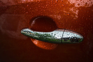 Handle orange car is wet