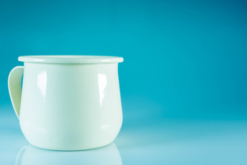 Cream Zinc Cup on Vintage Blue  Tone Background