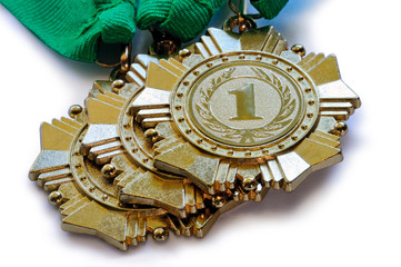 Metal medals of gold color for winners