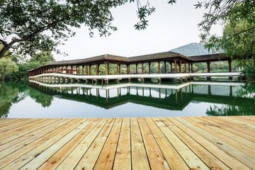 ancient traditional gallery bridge on the west lake in hangzhou,China