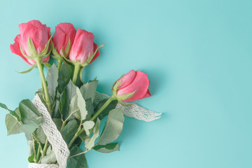 Background with Bouquet of Roses and Ribbon © Andrey Cherkasov