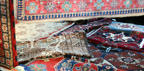 many precious ancient colored wool rugs made by hand