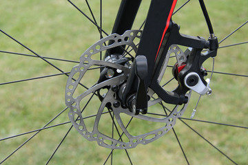 The Disc Brake on the Wheel of a Racing Bicycle.