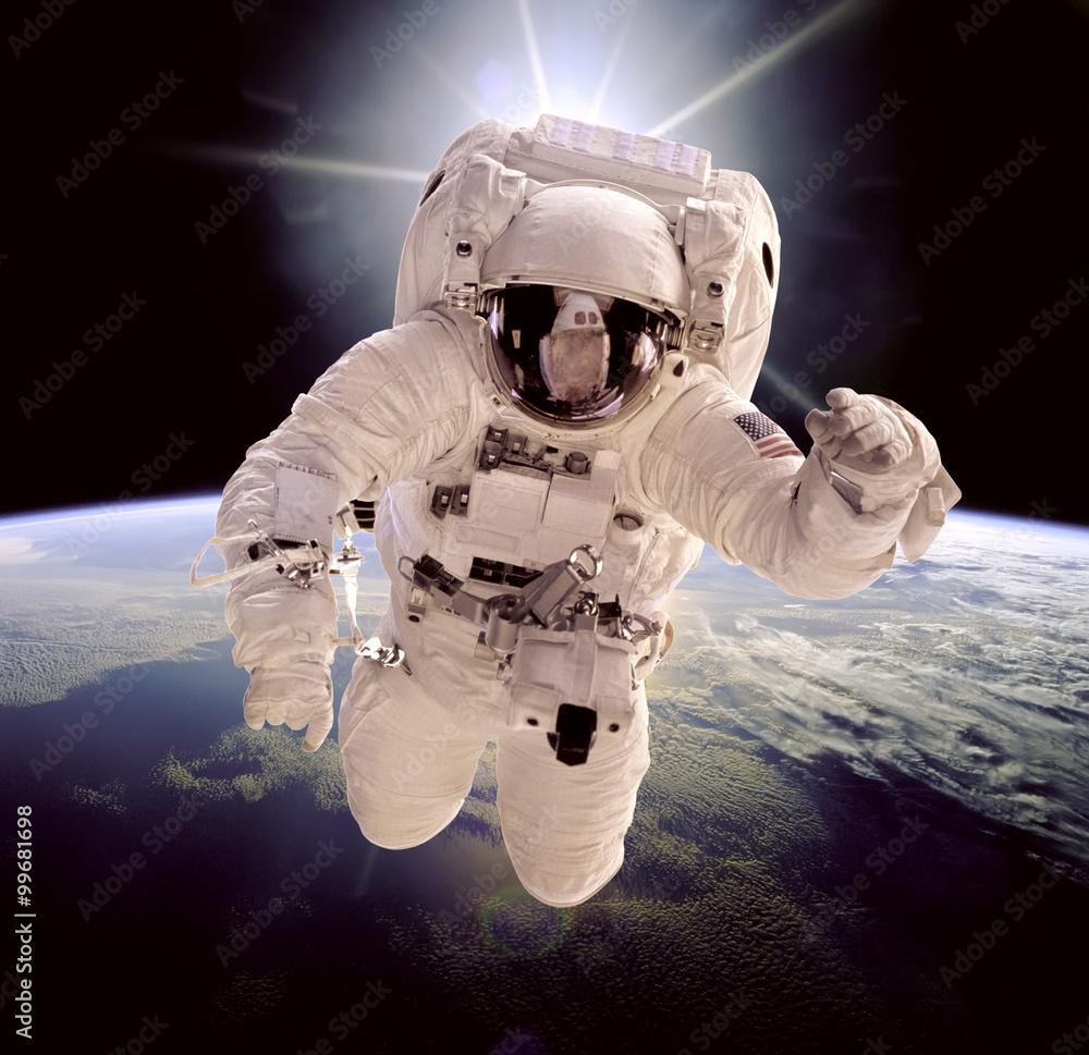 Wall mural astronaut in outer space