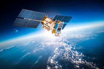 Obraz premium Kosmiczny satelita nad planetą Ziemią