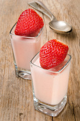 strawberries and yoghurt in a glass