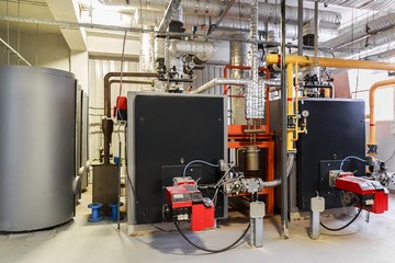 The interior of gas boiler, with two boilers.