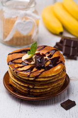 Delicious pancakes with bananas and chocolate.
