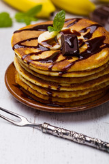 Delicious pancakes with bananas and chocolate.