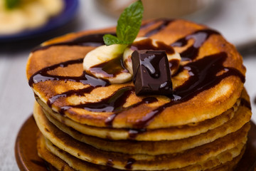 Delicious pancakes with bananas and chocolate.