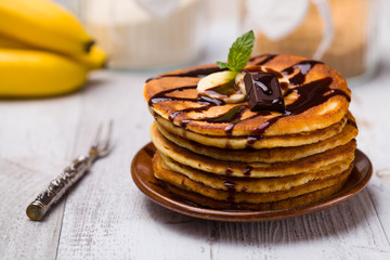 Delicious pancakes with bananas and chocolate.