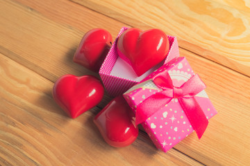 Gift of love. hearty gift. A gift box with a red heart inside.