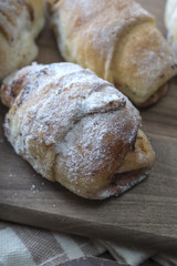 Baked croissants stuffed with jam