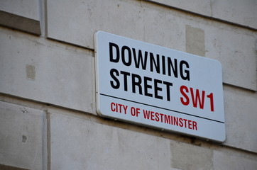 Downing Street's sign in Westminster. Downing St. has housed government leaders for over three hundred years.
