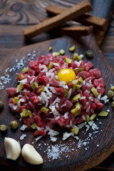 Beef steak tartare, selective focus, close-up