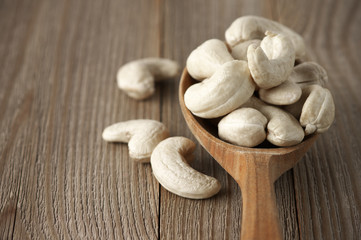 Cashew nuts in wooden spoon