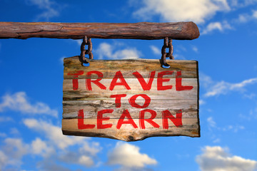 Travel to learn motivational phrase sign