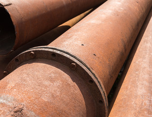 Rusty metal pipes stack