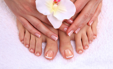 Beautiful feet with perfect spa french nail pedicure