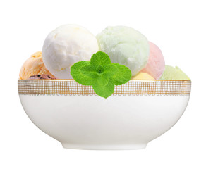 Scoop of fruit ice cream with mint herb in plate isolated on whi