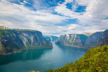 Aurlandsfjord landscape with blue sky and clouds, Norway.