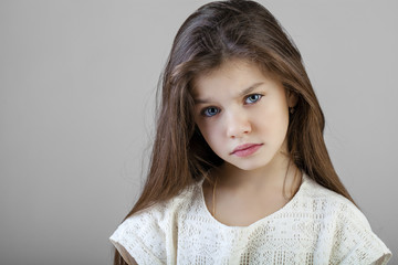 Portrait of a charming brunette little girl