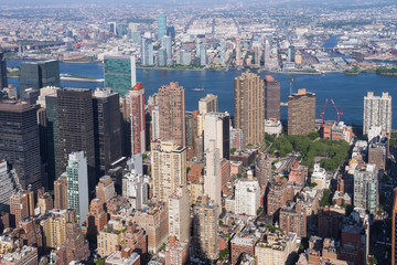 Panoramic view of Manhattan, East River and Queens as seen from the Empire State Building...