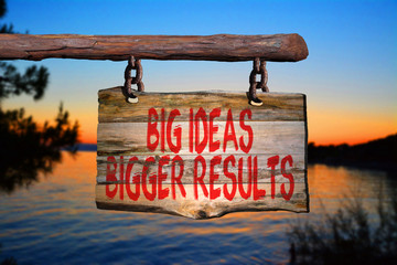 Big ideas bigger results motivational phrase sign