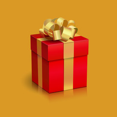 Red present box with golden ribbon bow.