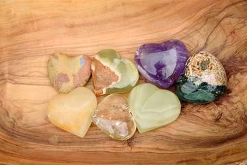 Group of colourful hearts on the wood