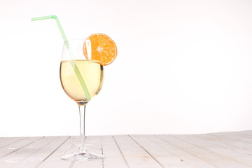 champagne wine glass and slice orange